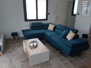 Część wypoczynkowa w obiekcie Appartement fonctionnel proche du centre ville