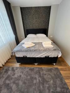 Cama ou camas em um quarto em Fatih / Aksaray - Yusufpaşa
