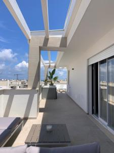 a view from the balcony of a house at Emme Urban Suites in Polignano a Mare