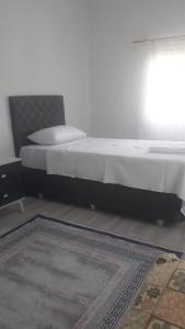 Postel nebo postele na pokoji v ubytování TERAS EV
