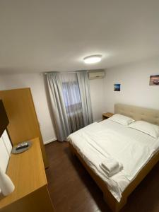 Postel nebo postele na pokoji v ubytování N&D Villa