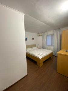 Postel nebo postele na pokoji v ubytování N&D Villa