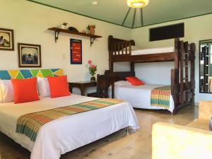 Postel nebo postele na pokoji v ubytování Mamatina Hotel