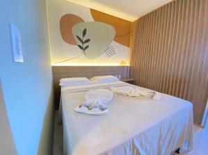 Postel nebo postele na pokoji v ubytování FLAT ECO RESORT PRAIA DOS CARNEIROS + 37 fotografií
