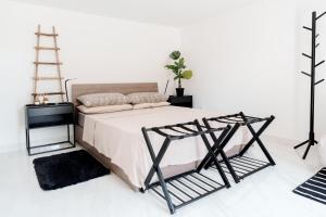 Ένα ή περισσότερα κρεβάτια σε δωμάτιο στο La Stanza del Relax
