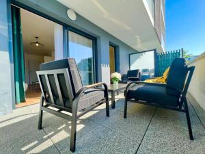 Posezení v ubytování ParcAppart 2 - Terrasse - Parking - Netflix