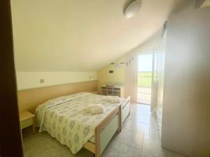 Voodi või voodid majutusasutuse Hotel Vianello toas