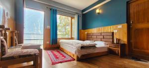 Postel nebo postele na pokoji v ubytování Rudra homestays