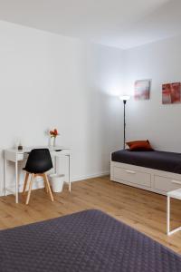 Letto o letti in una camera di B&B In Piazza