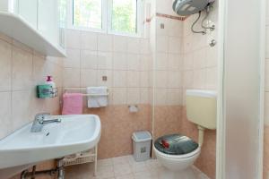 Kúpeľňa v ubytovaní Apartments Marija Sabina + 37 fotografií