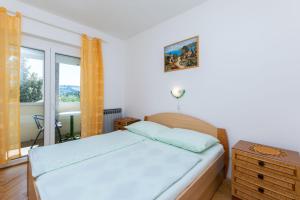 Posteľ alebo postele v izbe v ubytovaní Apartments Marija Sabina