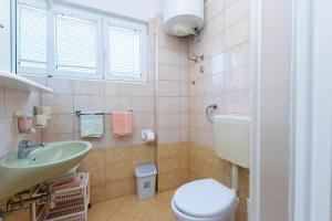 Kúpeľňa v ubytovaní Apartments Marija Sabina