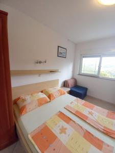 Posteľ alebo postele v izbe v ubytovaní Apartments Marija Sabina