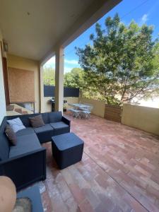 Balkón alebo terasa v ubytovaní Appartement proche mer avec terrasse et jardin privatif