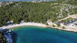 an aerial view of a beach with boats in the water at Mobile Home L&L in Drage