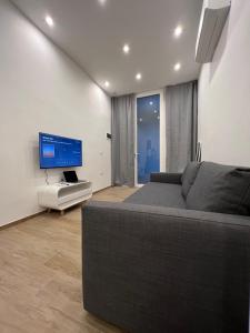 TV a/nebo společenská místnost v ubytování Citywise Vittorio - Independent Apartment near Bari central station