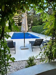 Bazén v ubytovaní Apartments Villa Ohana alebo v jeho blízkosti