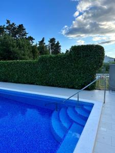 Bazén v ubytovaní Apartments Villa Ohana alebo v jeho blízkosti