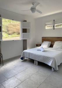Postel nebo postele na pokoji v ubytování Spacieux appartement à La Villa Montagne