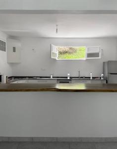 Kuchyň nebo kuchyňský kout v ubytování Spacieux appartement à La Villa Montagne