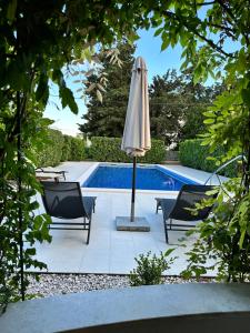 Bazén v ubytovaní Apartments Villa Ohana alebo v jeho blízkosti