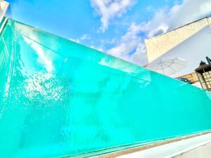 a swimming pool with the sky in the background at Villa Trousas Kassiopi with private pool in Kassiopi