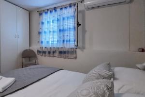 Postel nebo postele na pokoji v ubytování Apartment Z + 8 fotografií