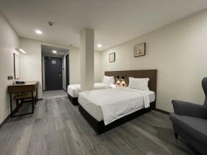 Postel nebo postele na pokoji v ubytování Hotel Bundusan + 37 fotografií