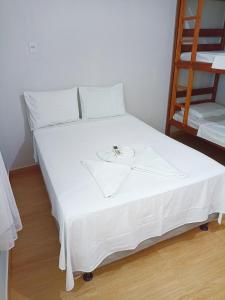 Postel nebo postele na pokoji v ubytování Hospedaje MorroSP