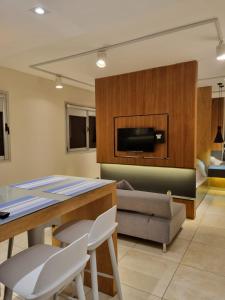 a living room with a table and a couch at Apart Rivadavia340 in Neuquén