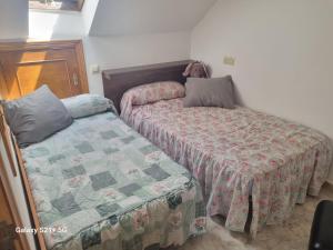 Postel nebo postele na pokoji v ubytování Triplex corral(centro grove)