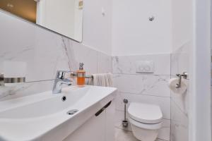 Koupelna v ubytování Appartment Ksenija 4