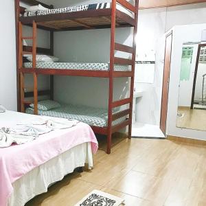 Postel nebo postele na pokoji v ubytování Hospedaje MorroSP