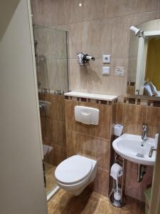 Kylpyhuone majoituspaikassa Apartmani Niksic
