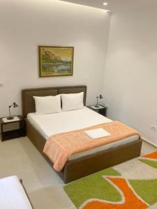 Postel nebo postele na pokoji v ubytování Guesthouse Niko
