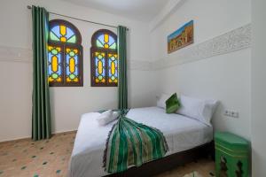 Riad SULTANA客房内的一张或多张床位