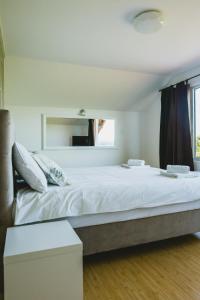 Ein Bett oder Betten in einem Zimmer der Unterkunft DUGA VIEW