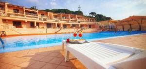 Bazén v ubytovaní Casa vacanze Magabù alebo v jeho blízkosti