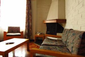 Posezení v ubytování Apartamentos Los Quipus