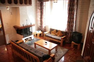 Posezení v ubytování Apartamentos Los Quipus