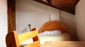 Postel nebo postele na pokoji v ubytování Apartamentos Los Quipus