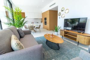 Et tv og/eller underholdning på Lagos Deluxe 2 With Pool by Homing