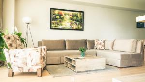 Posezení v ubytování Capitоl Suites & Apartments