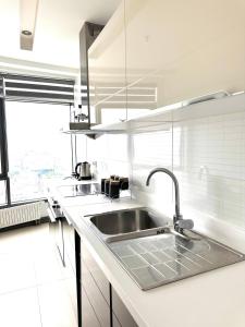 A kitchen or kitchenette at Mall Of İstanbul Residence