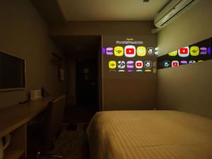TV a/nebo společenská místnost v ubytování Super Hotel Shonan Fujisawaeki Minamiguchi