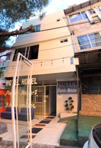 a hotel in front of a building at HOTEL PUERTO MEXICO 2 in Mexico City