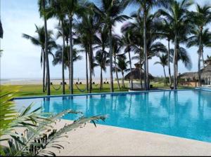 Imagen de la galería de Departamento con alberca y Club de playa en Diamante, en Barra Vieja