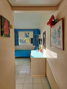 Foto dalla galleria di STUDIO FONCTIONNEL dans HOTEL CARAYOU SPA PISCINES a Les Trois-Îlets