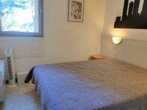 Giường trong phòng chung tại Appartement Argelès-sur-Mer, 2 pièces, 6 personnes - FR-1-225-792