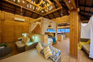 Posezení v ubytování Maliekal Heritance Cherai Beach Cochin